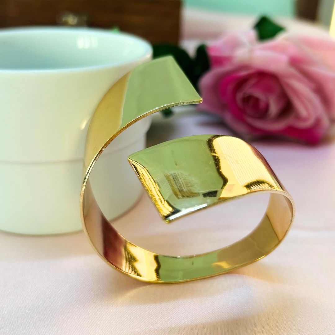 Golden Glam Twist Handcuff With Finger Ring