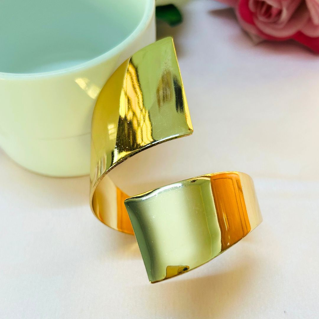 Golden Glam Twist Handcuff With Finger Ring