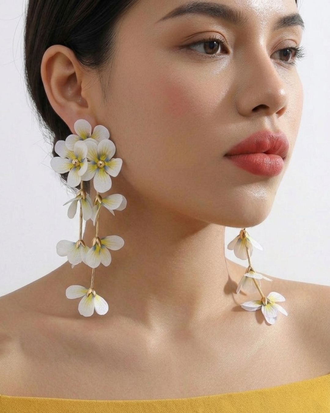 Feather-lite White Flower Tassel Earrings