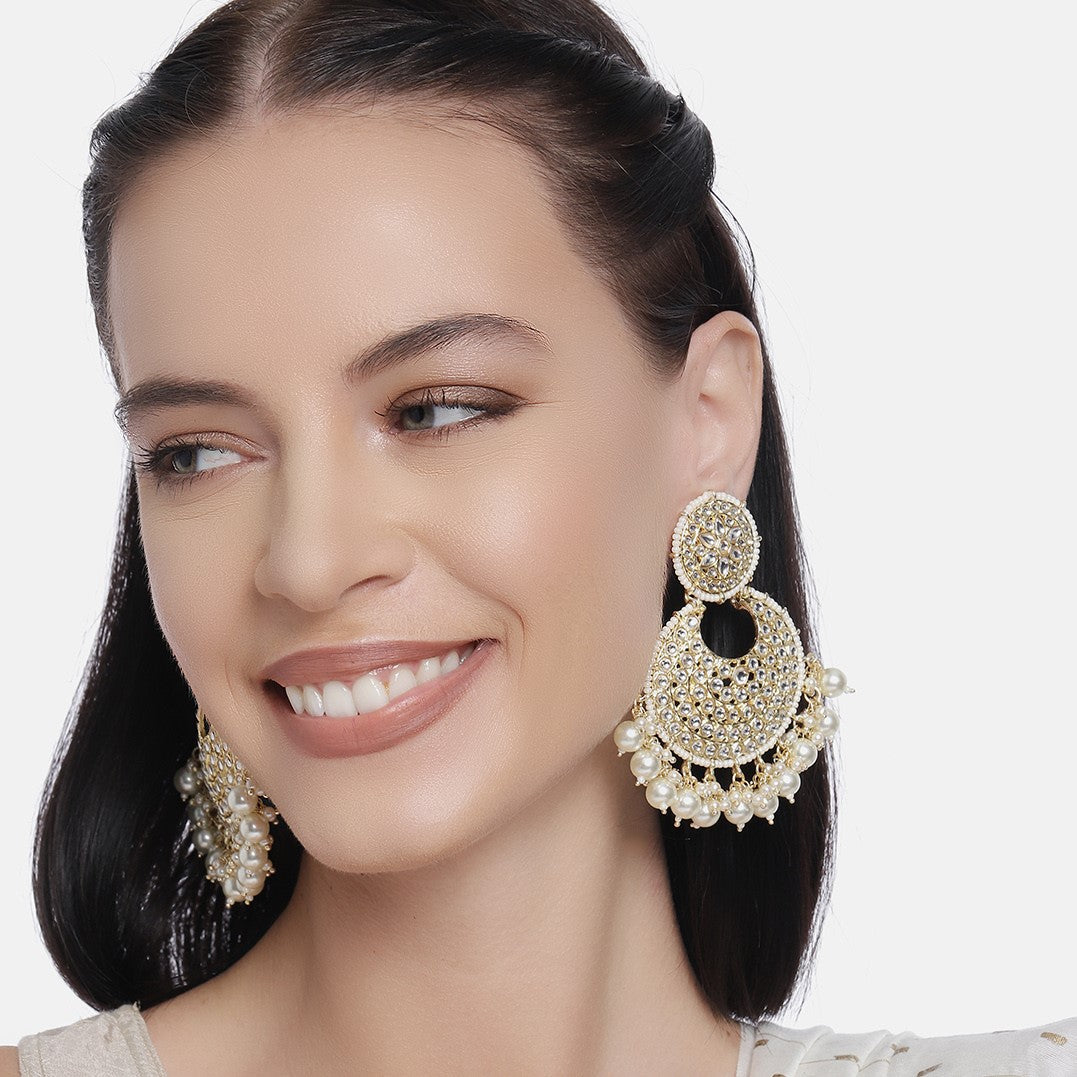 Gold-Plated & White Handcrafted Kundan Studded Crescent Shaped Chandbalis