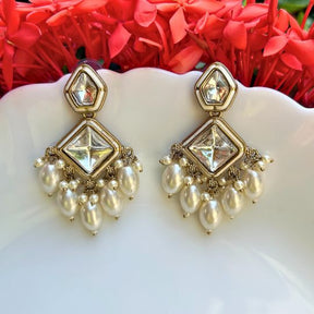 Sakhi White Kundan Coral Earrings