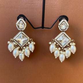 Sakhi White Kundan Coral Earrings