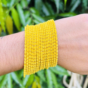 Chandni AD Gold Stone Studded 36 Yellow Bangles
