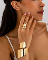 Golden Glam Twist Handcuff With Finger Ring
