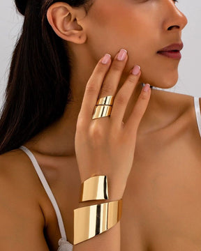 Golden Glam Twist Handcuff With Finger Ring