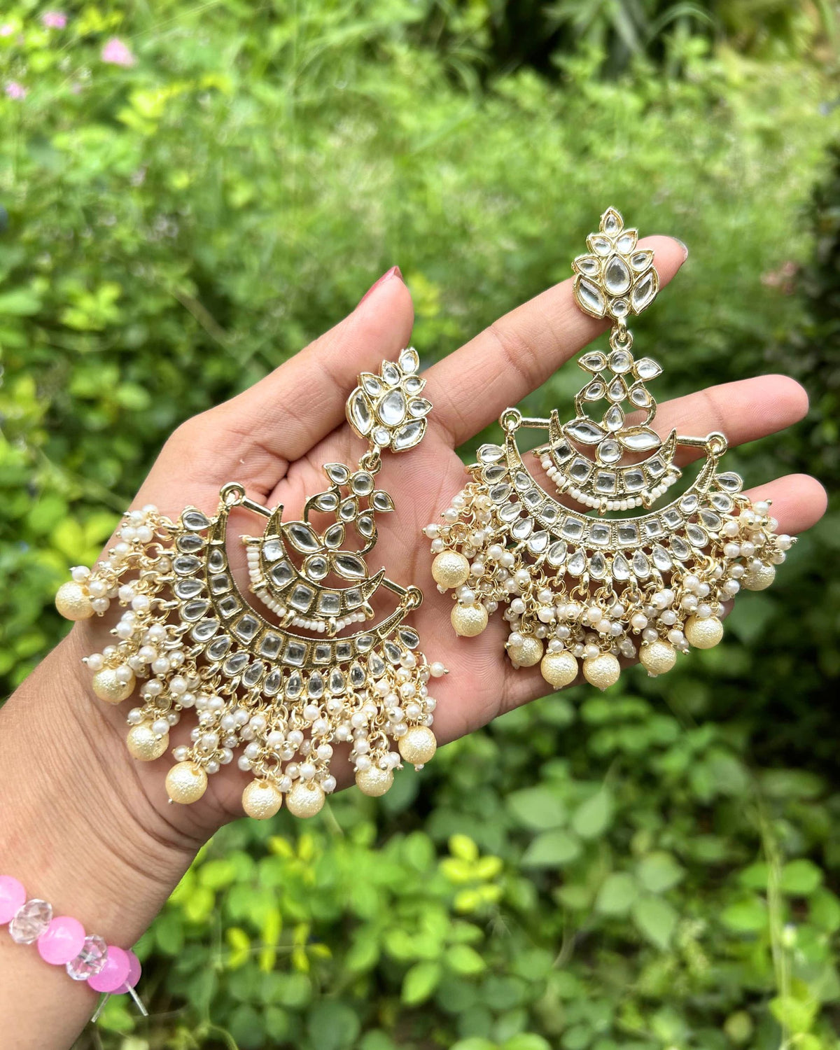 Gold Plated Handcrafted Kundan Studded Crescent Shaped Chandbalis