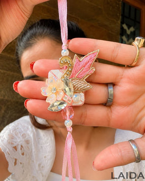 Handcrafted Peach Floral pearl Tassel Lumba Set - Rakhi
