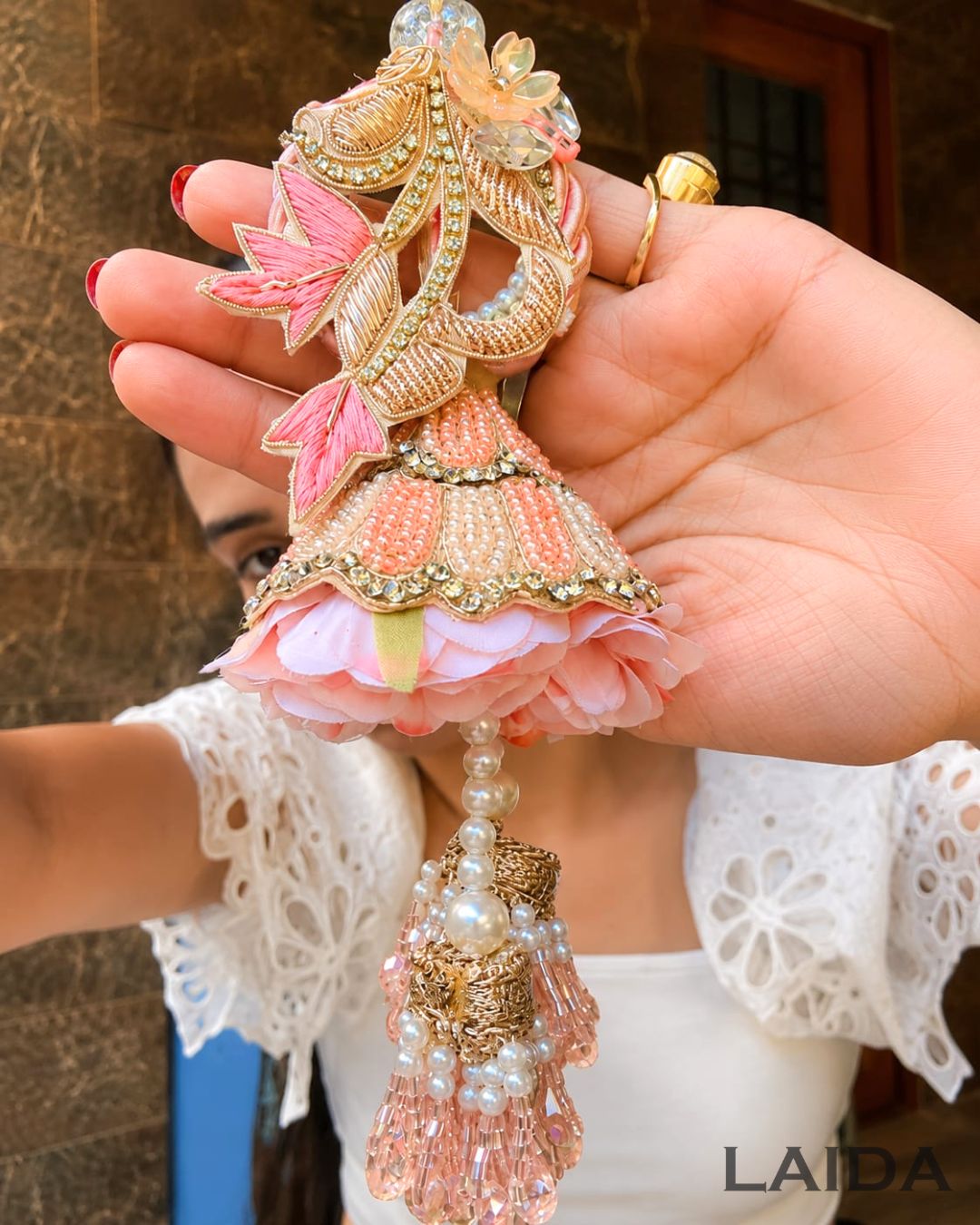 Handcrafted Peach Floral pearl Tassel Lumba Set - Rakhi