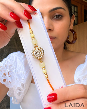Handmade Golden Rotating - Rakhi