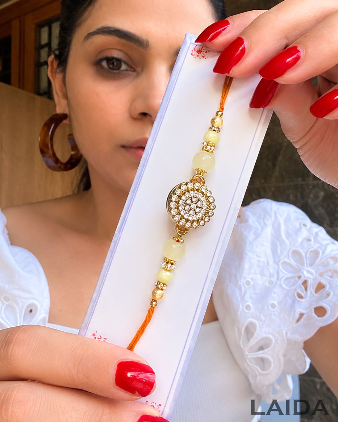 Handmade Golden Rotating - Rakhi