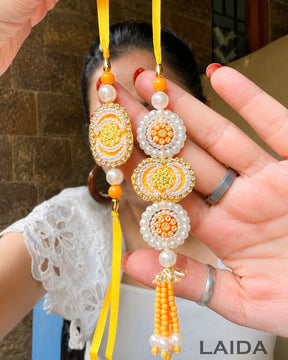Handcrafted Yellow Pearl Beaded Lumba Set - Rakhi