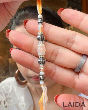 Handcrafted Peach Resin pearl Lumba Set - Rakhi