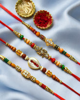 Set of 4 Rakhis - Swastik, Shankh and Mandir Rakhi