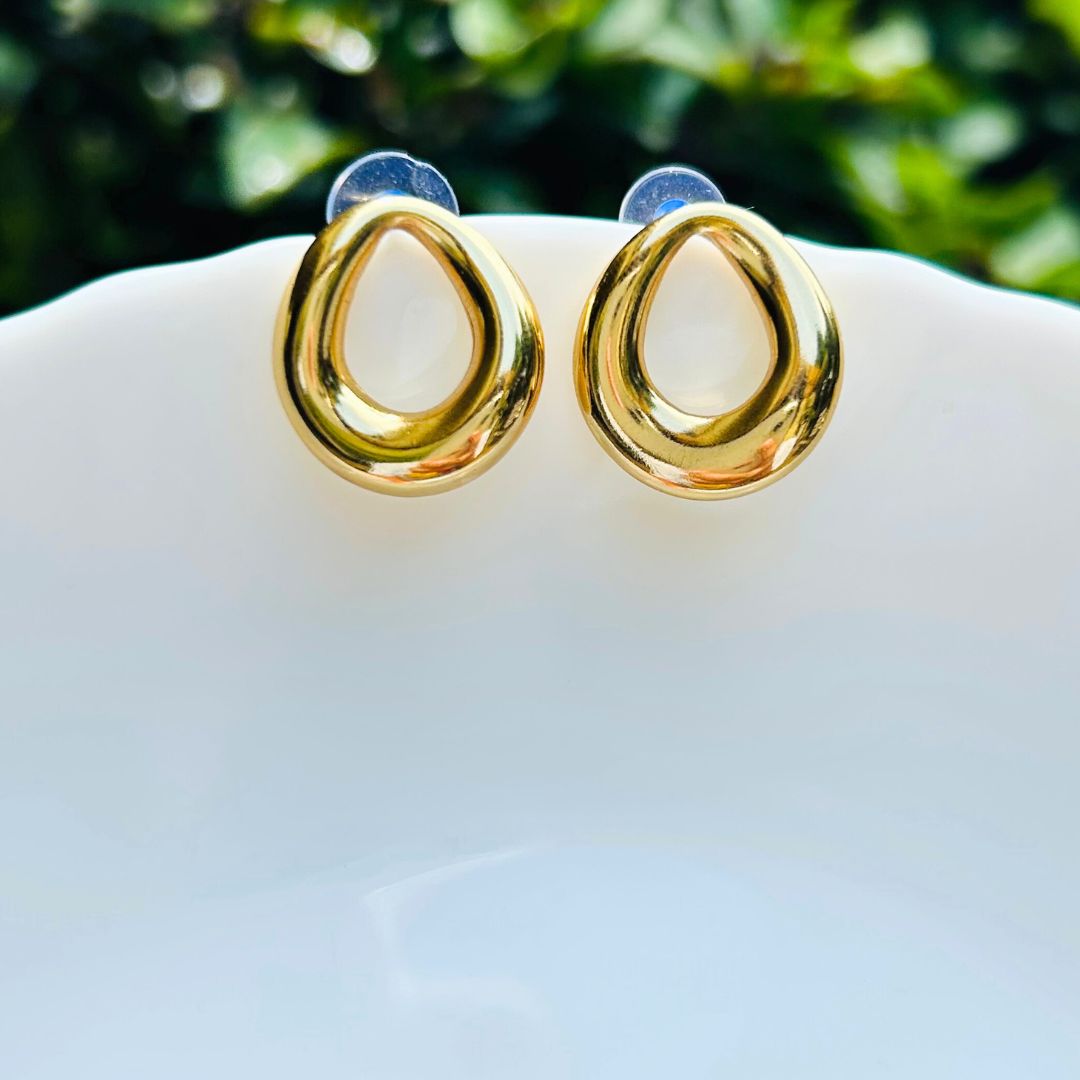 Hollow Oval Golden Stud Earrings